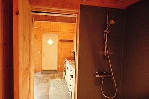 Múlafossur Cottages near Waterfall