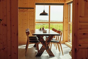 Múlafossur Cottages near Waterfall