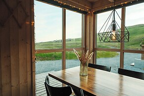 Múlafossur Cottages near Waterfall