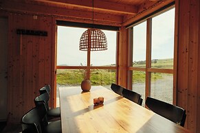 Múlafossur Cottages near Waterfall