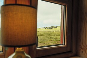 Múlafossur Cottages near Waterfall
