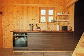 Múlafossur Cottages near Waterfall