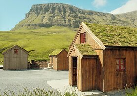 Múlafossur Cottages near Waterfall