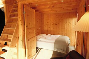 Múlafossur Cottages near Waterfall