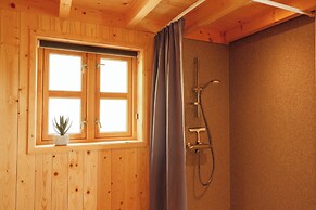 Múlafossur Cottages near Waterfall