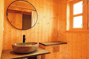 Múlafossur Cottages near Waterfall