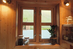 Múlafossur Cottages near Waterfall