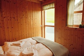 Múlafossur Cottages near Waterfall