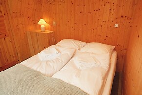 Múlafossur Cottages near Waterfall