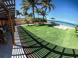 Casa pé na areia com 05 suítes