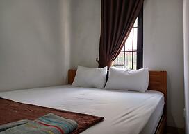 SPOT ON 92515 Timoti Guest House