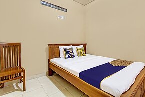 SPOT ON 92515 Timoti Guest House