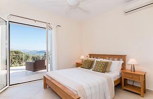 Omolos House in St Stefanos Bay