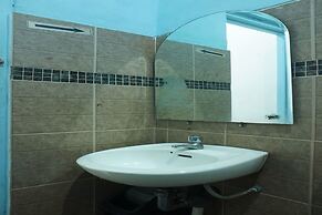 OYO 93122 Pondok Puti Sartika SyariahNearPasar Jum'at Aluh Aluh