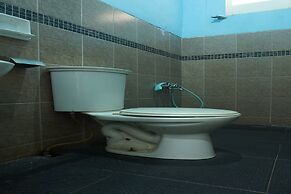 OYO 93122 Pondok Puti Sartika SyariahNearPasar Jum'at Aluh Aluh