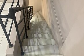 OYO 93122 Pondok Puti Sartika SyariahNearPasar Jum'at Aluh Aluh