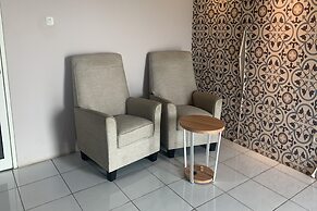 OYO 93122 Pondok Puti Sartika SyariahNearPasar Jum'at Aluh Aluh