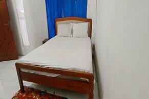 OYO 93122 Pondok Puti Sartika SyariahNearPasar Jum'at Aluh Aluh