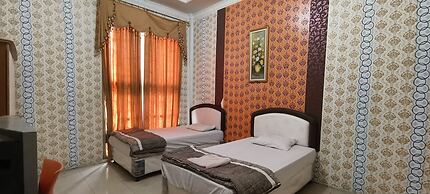 OYO 93123 Wisma Hamalau SyariahNearPulau Bromo Pedestrian Bridge