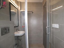 Qotel Hotel IP Residency