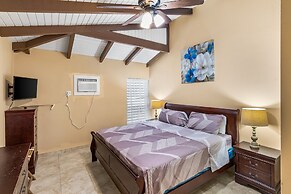 Caribbean View Style 1 Bedroom Condo by RedAwning