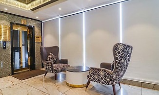 Fabhotel Twin Tree Suites