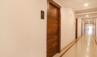 Fabhotel Twin Tree Suites