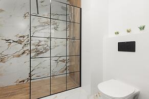 Modern Studio Mokotów by Renters