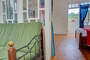 SPOT ON 91225 Kota Bunga Homestay Syariah