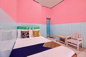 SPOT ON 92791 4 Saudara Hotel