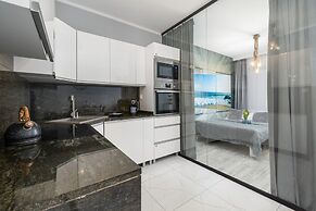 Beach Wave Apartment by Renters Prestige
