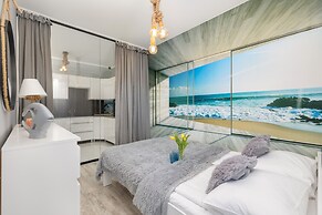 Beach Wave Apartment by Renters Prestige