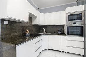 Beach Wave Apartment by Renters Prestige