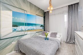 Beach Wave Apartment by Renters Prestige
