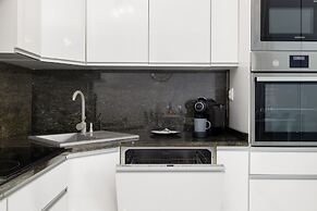 Beach Wave Apartment by Renters Prestige