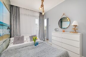 Beach Wave Apartment by Renters Prestige