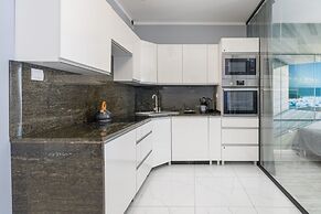 Beach Wave Apartment by Renters Prestige