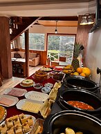 Pousada Araucária Suítes