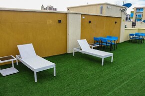 Luxury 4 Bedroom with a Rooftop Pool