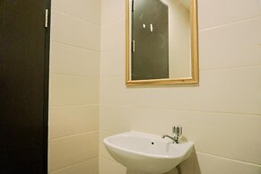 Homey And Cozy Stay Studio Belmont Residence Puri Apartement