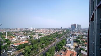 Good Location And Comfy 2Br At Tamansari Papilio Apartment