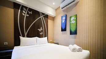 Good Location And Comfy 2Br At Tamansari Papilio Apartment