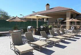 Two CozySuites TPC condos with parking and pool