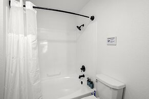 Two CozySuites TPC condos with parking and pool