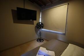 One Living by Roots Rentals