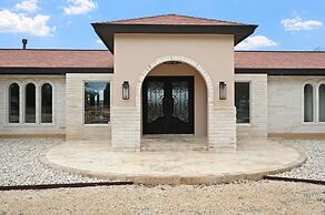 Guadalupe Bluff Mediterranean 5 Bedroom Home by RedAwning