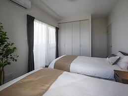 &Monde. Okinawa Arena Condominium