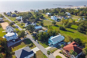 Sunny Waveland Home Rental w/ Pool: Walk to Beach!