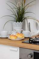 Warsaw Saski Garden Apartment by Renters