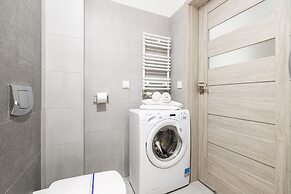 Nadbrzeżna Apartment by Renters